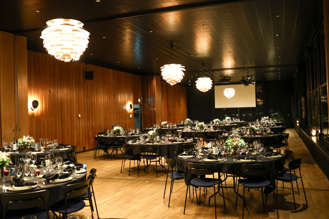Prepared event venue interior with dining tables